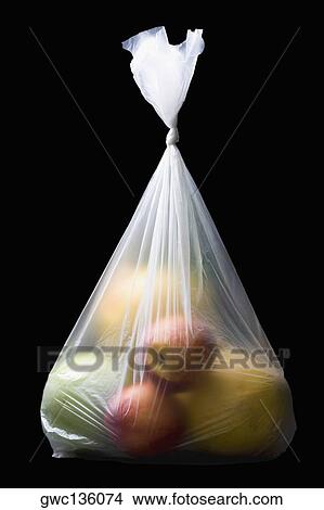 Close-up of two apples and three oranges in a plastic bag View Large Photo Image Picture - Close-up of two apples and three oranges in a plastic bag. Fotosearch