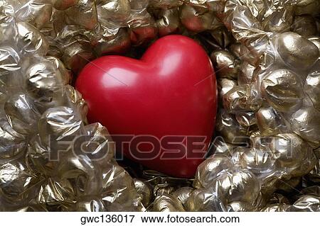 Stock Photo - High angle view of a heart in a package. Fotosearch
