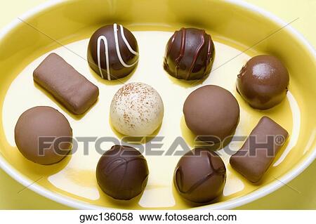 High angle view of assorted chocolates in a tray View Large Photo Image Stock Photo - High angle view of assorted chocolates in a tray. Fotosearch