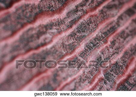 Stock Photo - Close-up of a pattern on fabric. Fotosearch
