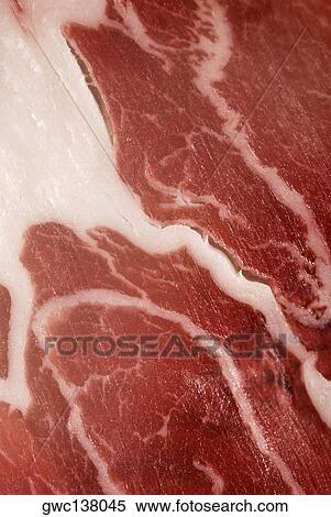 Close-up of a raw beef steak View Large Photo Image Stock Photography - Close-up of a raw beef steak. Fotosearch