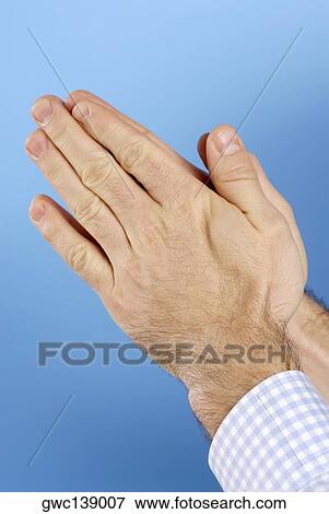 Close-up of a man's hands in a prayer position View Large Photo Image Stock Photo - Close-up of a man's hands in a prayer position. Fotosearch