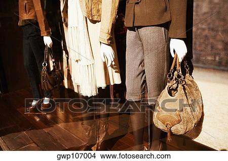 Close-up of mannequins in a clothing store View Large Photo Image Picture - Close-up of mannequins in a clothing store. Fotosearch