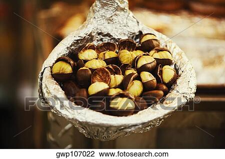 Close-up of walnuts in a container View Large Photo Image Stock Image - Close-up of walnuts in a container. Fotosearch