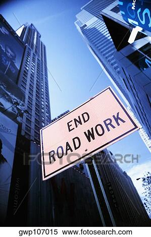 Low angle view of a sign board in front of skyscrapers, New York City, New York State, USA View Large Photo Image Stock Photography - Low angle view of a sign board in front of skyscrapers, New York City, New York State, USA. Fotosearch