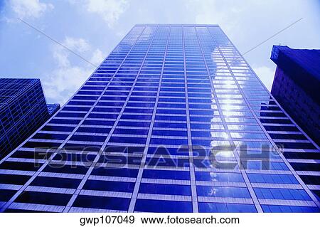 Low angle view of office buildings View Large Photo Image Stock Photo - Low angle view of office buildings. Fotosearch