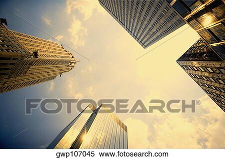 Low angle view of office buildings, Chrysler Building, Manhattan, New York City, New York State, USA View Large Photo Image Stock Photography - Low angle view of office buildings, Chrysler Building, Manhattan, New York City, New York State, USA. Fotosearch