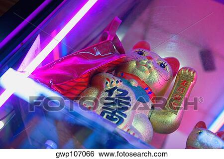 Low angle view of the figurine of a mouse with a bag View Large Photo Image Stock Photograph - Low angle view of the figurine of a mouse with a bag. Fotosearch