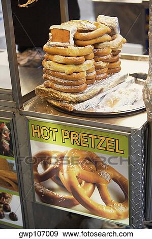 Stack of pretzels at a stall View Large Photo Image Stock Photo - Stack of pretzels at a stall. Fotosearch