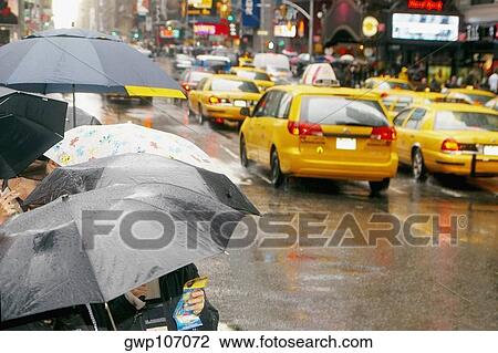Tourists standing at the roadside, New York City, New York State, USA View Large Photo Image Stock Image - Tourists standing at the roadside, New York City, New York State, USA. Fotosearch