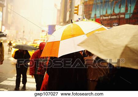 Tourists walking at the roadside, New York City, New York State, USA View Large Photo Image Stock Photo - Tourists walking at the roadside, New York City, New York State, USA. Fotosearch