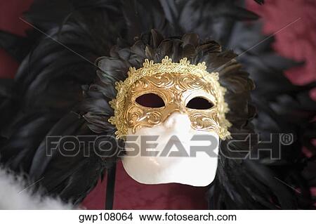 Picture - Close-up of a feathered mask, Venice, Veneto, Italy. Fotosearch