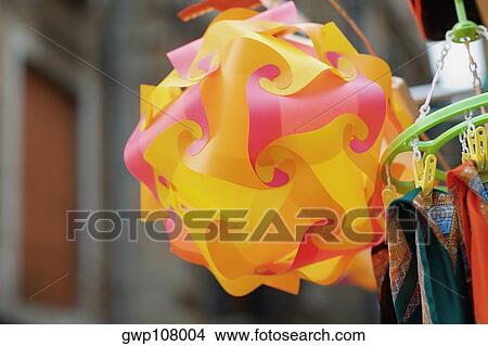 Close-up of scarf's hanging near a paper lantern, Venice, Veneto, Italy View Large Photo Image Picture - Close-up of scarf's hanging near a paper lantern, Venice, Veneto, Italy. Fotosearch