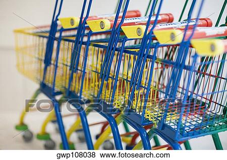 Close-up of shopping carts in a row, Venice, Veneto, Italy View Large Photo Image Stock Photo - Close-up of shopping carts in a row, Venice, Veneto, Italy. Fotosearch
