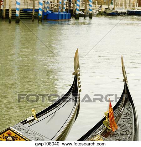 High angle view of two gondolas in a canal, Venice, Veneto, Italy View Large Photo Image Stock Image - High angle view of two gondolas in a canal, Venice, Veneto, Italy. Fotosearch