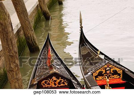 High angle view of two gondolas in a canal, Venice, Veneto, Italy View Large Photo Image Stock Image - High angle view of two gondolas in a canal, Venice, Veneto, Italy. Fotosearch