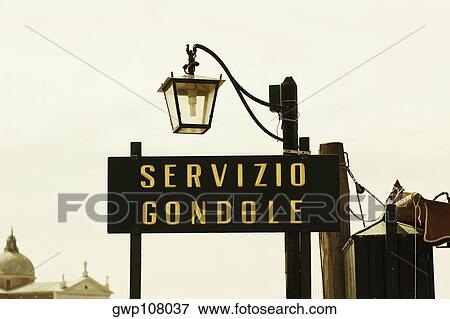Stock Photo - Lantern over an information board, Venice, Veneto, Italy. Fotosearch