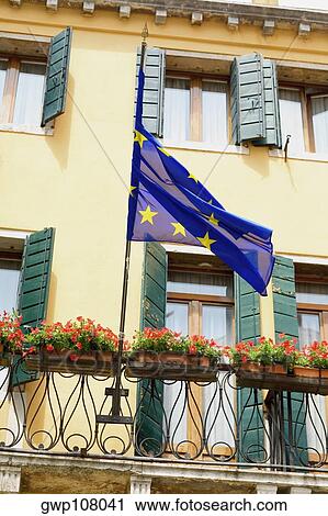Low angle view of an European union flag on a railing, Venice, Veneto, Italy View Large Photo Image Stock Image - Low angle view of an European union flag on a railing, Venice, Veneto, Italy. Fotosearch