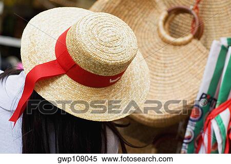 Rear view of a woman at a market stall View Large Photo Image Stock Photography - Rear view of a woman at a market stall. Fotosearch