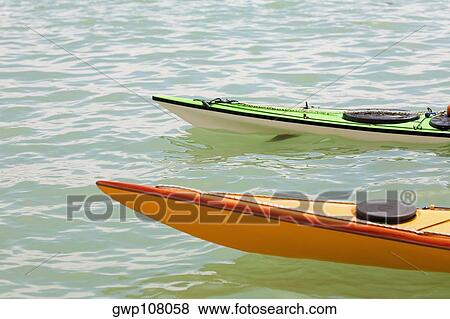 Two kayaks in a river, Venice, Veneto, Italy View Large Photo Image Stock Photo - Two kayaks in a river, Venice, Veneto, Italy. Fotosearch