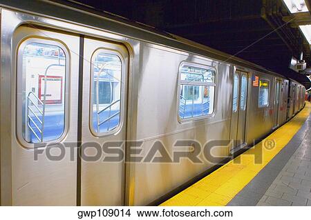 Subway train at a subway platform View Large Photo Image Picture - Subway train at a subway platform. Fotosearch