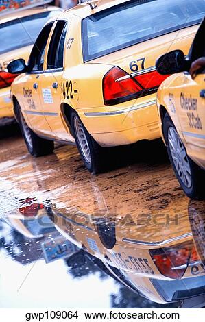 Taxi cabs waiting in a row, Savannah, Georgia, USA View Large Photo Image Picture - Taxi cabs waiting in a row, Savannah, Georgia, USA. Fotosearch