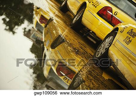 Taxi cabs waiting in a row, Savannah, Georgia, USA View Large Photo Image Stock Photograph - Taxi cabs waiting in a row, Savannah, Georgia, USA. Fotosearch