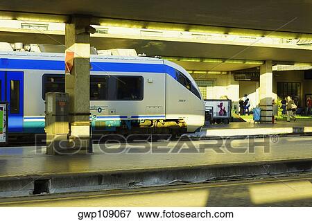 Train at a railroad station platform, Rome, Italy View Large Photo Image Stock Photo - Train at a railroad station platform, Rome, Italy. Fotosearch