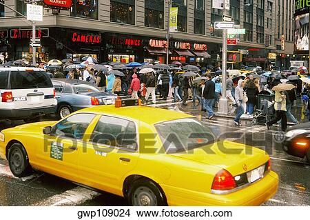 Yellow taxi on the road View Large Photo Image Picture - Yellow taxi on the road. Fotosearch