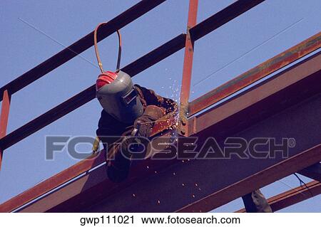 Man welding at construction site, Maryland View Large Photo Image Stock Image - Man welding at construction site, Maryland. Fotosearch