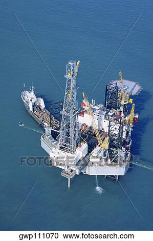 Oil drilling platform in the Mediterranean View Large Photo Image Stock Image - Oil drilling platform in the Mediterranean . Fotosearch