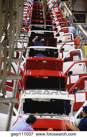 Overhead view of Nissan trucks near end of assembly line, Smyrna, Tennessee View Large Photo Image Stock Photo - Overhead view of Nissan trucks near end of assembly line, Smyrna, Tennessee . Fotosearch