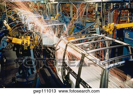 Robots weld van bodies at GM plant, Baltimore, Maryland View Large Photo Image Stock Image - Robots weld van bodies at GM plant, Baltimore, Maryland. Fotosearch
