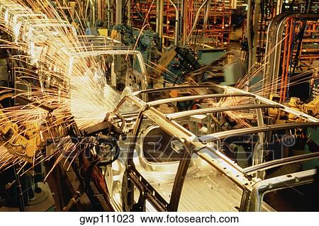 Robots weld van bodies at GM plant, Baltimore, Maryland View Large Photo Image Stock Image - Robots weld van bodies at GM plant, Baltimore, Maryland. Fotosearch