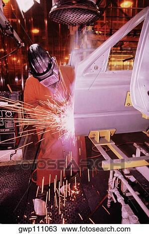 Welders working on car doors, Newark, Delaware View Large Photo Image Stock Image - Welders working on car doors, Newark, Delaware. Fotosearch