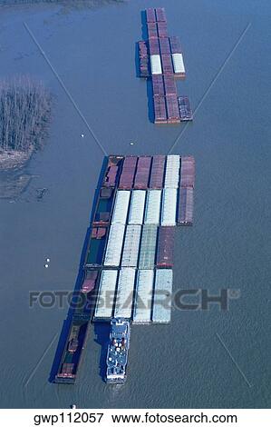 Barge traffic on the Mississippi Rive, New Orleans View Large Photo Image Stock Photo - Barge traffic on the Mississippi Rive, New Orleans. Fotosearch