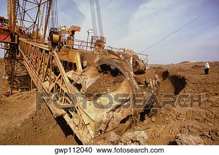 Large earth-moving machine View Large Photo Image Stock Image - Large earth-moving machine. Fotosearch