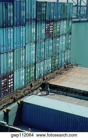 Picture - Stacks of containers at a shipyard. Fotosearch