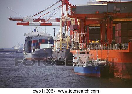 Stock Photo - Boat docked at a harbor, Nanko Port Town Line, Osaka prefecture, Japan. Fotosearch