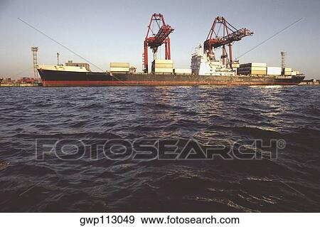 Container ship at a port, Kobe, Japan View Large Photo Image Stock Photo - Container ship at a port, Kobe, Japan. Fotosearch
