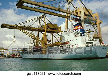 Container ship moored at a commercial dock, Singapore View Large Photo Image Stock Image - Container ship moored at a commercial dock, Singapore. Fotosearch