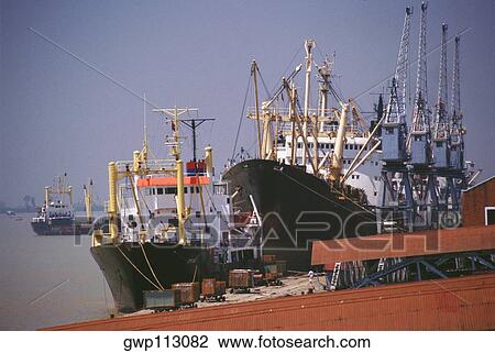 Container ships moored at a dock, Yangon, Myanmar View Large Photo Image Stock Image - Container ships moored at a dock, Yangon, Myanmar. Fotosearch