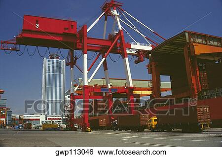 Containers at a commercial dock, Osaka Prefecture, Japan View Large Photo Image Stock Photograph - Containers at a commercial dock, Osaka Prefecture, Japan. Fotosearch