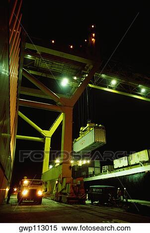 Crane lifting a container at marine terminal, Hong Kong, China View Large Photo Image Stock Photography - Crane lifting a container at marine terminal, Hong Kong, China. Fotosearch