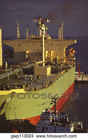 Picture - High angle view of a supertanker at a harbor, Kobe, Japan. Fotosearch