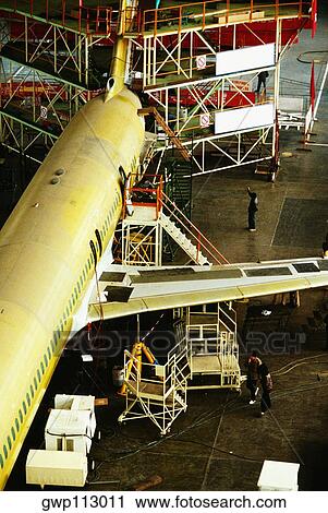 Stock Image - High angle view of an airplane in an airplane factory, Shanghai, China. Fotosearch