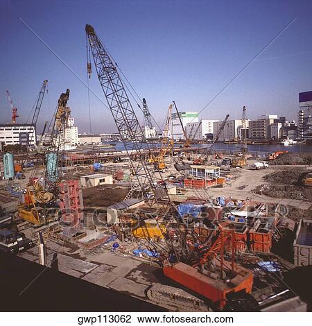 High angle view of cranes at a construction site, Tokyo Prefecture, Japan View Large Photo Image Stock Image - High angle view of cranes at a construction site, Tokyo Prefecture, Japan. Fotosearch
