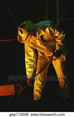 Male worker working in a steel mill, Kawasaki, Kanagawa Prefecture, Japan View Large Photo Image Stock Photo - Male worker working in a steel mill, Kawasaki, Kanagawa Prefecture, Japan. Fotosearch