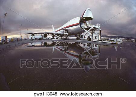 Stock Photo - Reflection of a jet fighters in water, Tokyo Prefecture, Japan. Fotosearch