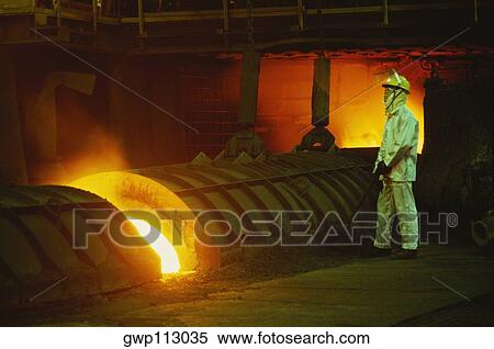Side profile of a male worker working in a steel mill, Kawasaki, Honshu, Japan View Large Photo Image Stock Photography - Side profile of a male worker working in a steel mill, Kawasaki, Honshu, Japan. Fotosearch